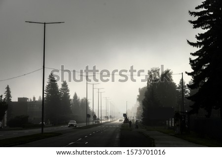 City in haze at day, air pollution concept photo