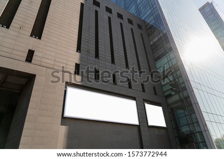 light box in city on the wall of building