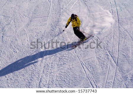 A man is skiing at a ski resort