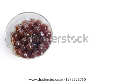A picture of pearl tea or some call tapioca pearl used for boba tea on white background. Boba tea is a trending drink in Malaysia.