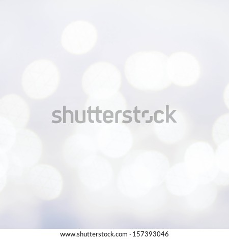 Elegant Defocused  Christmas background with snowflakes, bokeh  and place for text.
