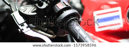 the handlebars of motorcycle  black.selective focus