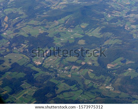 Aerial view flying over Maryland State, US, seen from an airplane window.