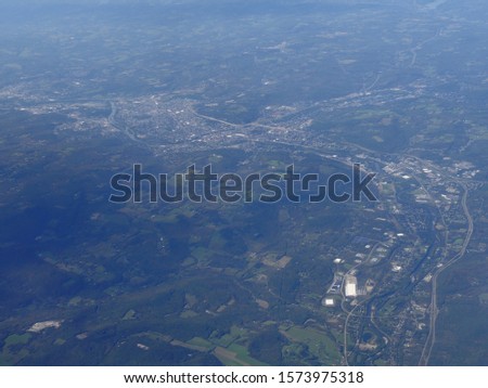Wide aerial view over Maryland, seen from an airplane window.