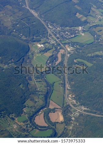 Portrait view, aerial shot  over Maryland, seen from an airplane window.