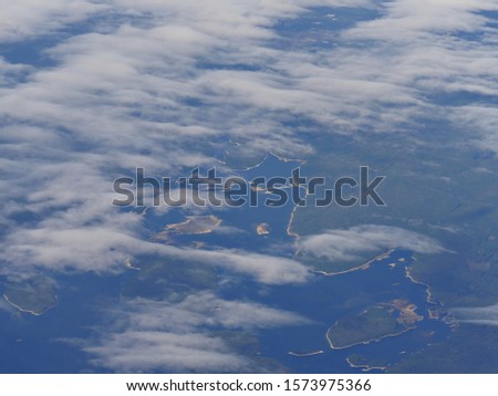 Aerial view of east coast islands and islets seen from an airplane window