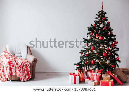 Christmas tree with red gifts Christmas interior decor as background