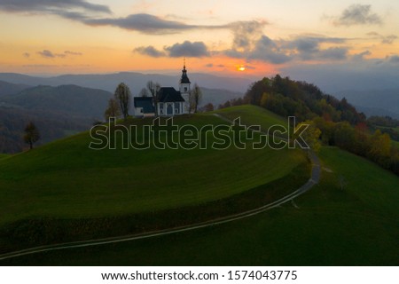 Serene Sunset Over Rural Farm Landscape - A Spiritual Connection