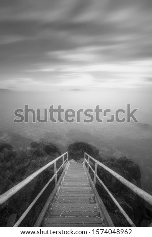 black white long exposure clouds stairs sea dramatic