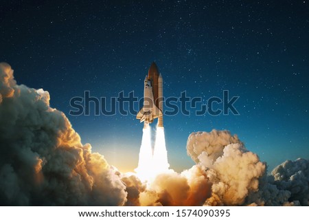 New Ship flies to another planet. Spaceship takes off into the starry sky. Rocket starts into space. Concept Royalty-Free Stock Photo #1574090395