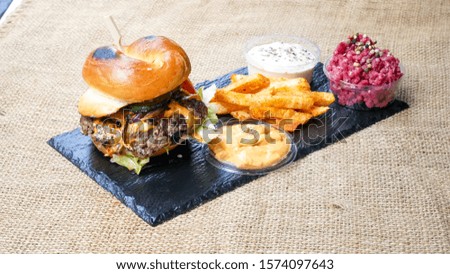 Burger and fries on a table