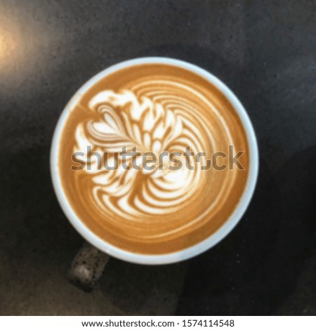 Blurred abstract background of various coffe latte art.