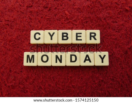 Cyber Monday, word cube with background.