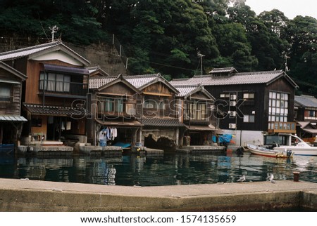 seaside view, wooden house at Ine no funaya fishing village in Kyoto, Japan 
