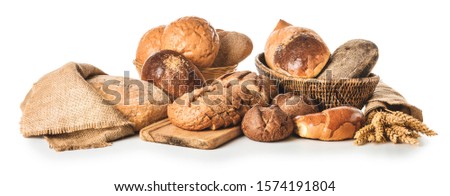 Assortment of fresh bakery products on white background Royalty-Free Stock Photo #1574191804