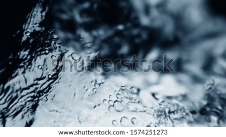 Close up of swimming pool water bubbles background
