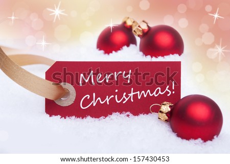 A Red Tag with a White Merry Christmas on It as Christmas Background