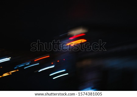  Lights in motion at night as an abstract background.