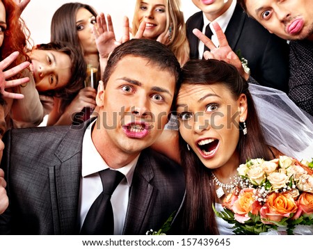 Bride and groom in photo-booth. Wedding. Royalty-Free Stock Photo #157439645