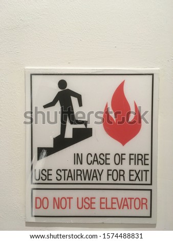In Case of Fire Use Stairway for Exit-Do Not Use Elevator Sign