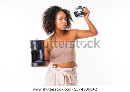 Alive african woman in summer clothes with coffe maker, picture isolated on white background