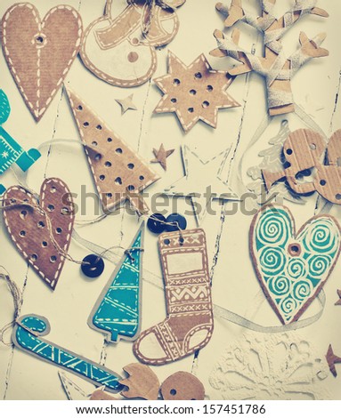Vintage background with handmaid christmas decorations/Christmas card with christmas symbols