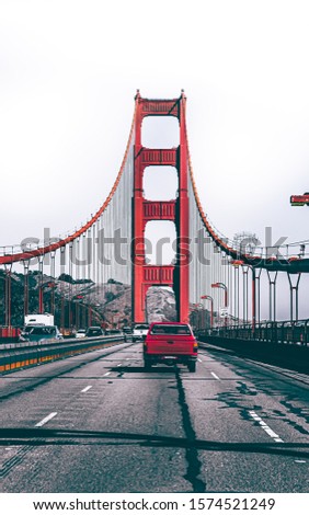 Image taken while on the bridge. Never seen before view of the Golden Gate bridge.  Thick fog giving the bridge a very good contrast.