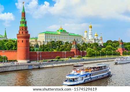 Kremlin across Moskva river with excursion boats, Moscow, Russia Royalty-Free Stock Photo #1574529619