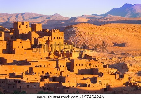 Ait Benhaddou,fortified city, kasbah or ksar, along the former caravan route between Sahara and Marrakesh in present day Morocco. It is situated in Souss Massa Draa on a hill along the Ounila River. Royalty-Free Stock Photo #157454246