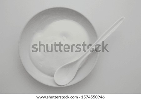 Abstract picture of yoghurt and fruit.