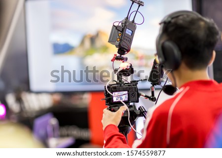 Camera show viewfinder image catch motion in interview or broadcast wedding ceremony, catch feeling, stopped motion in best memorial day concept.Video Cinema From dslr camera.video cinema production .