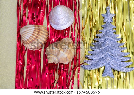 Christmas decorations and Christmas toys combined with sea stars and shells 