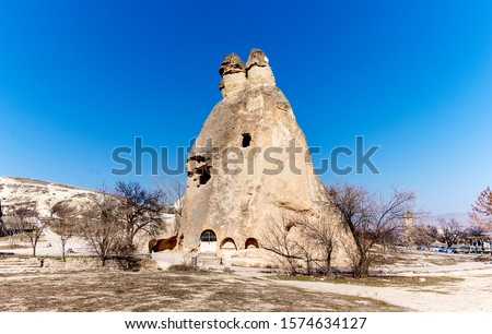 View of the Fairy Chimneys Peri Bacalari in Avanos Urgup Goreme Cappadocia Turkey Royalty-Free Stock Photo #1574634127