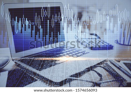 Double exposure of forex chart and work space with computer. Concept of international online trading.