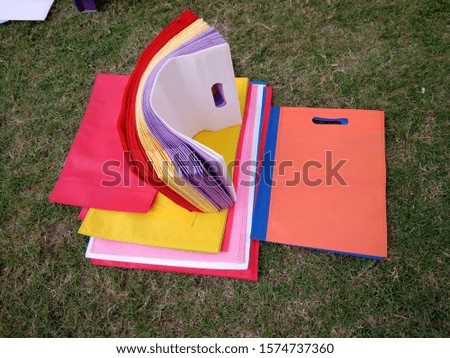 above view ECO Friendly Non Woven Fabric Bags on Green Grass