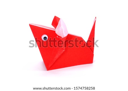 Origami paper red mouse isolated on white background. Ideas for DIY hobby (Do It Yourself) for Children. Chinese Zodiac                             