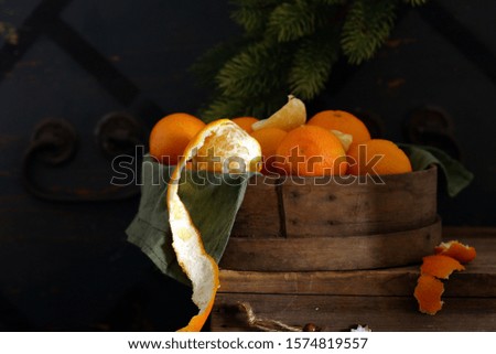 natural orange tangerines on the table, christmas still life