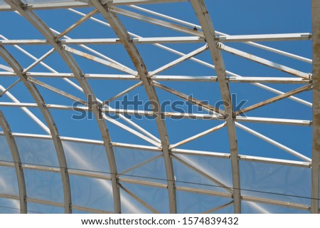 Detail of metallic roof in round - circular shape.