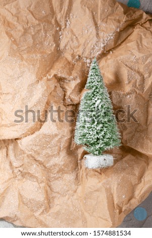 Christmas tree on snow craft paper