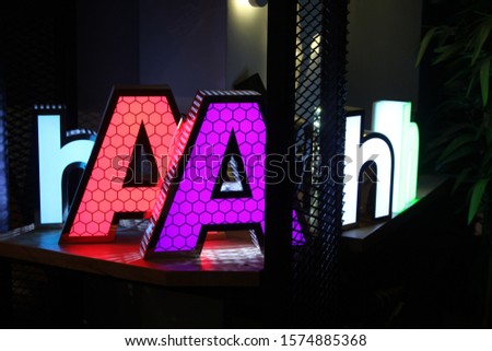 alphabet AA h box letter purple red green
advertising