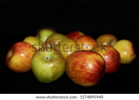 group of Colorful fruit pattern of fresh apples on black background