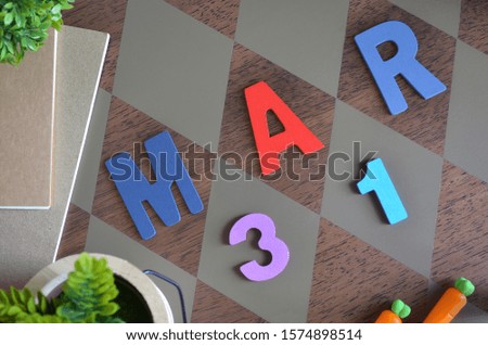 March 31, Appointment with wooden text design for background.
