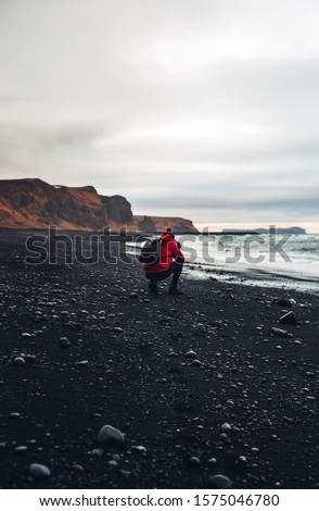 Photographer making photo on the beach. 