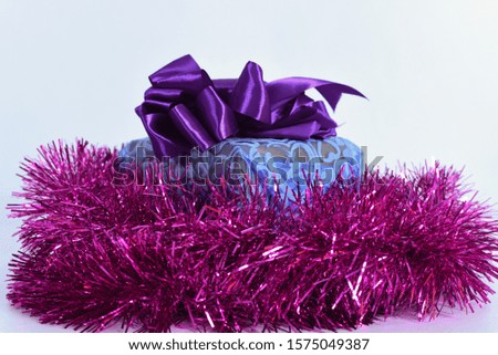 Christmas gift box and dice white background