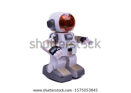 children's toy, white robot with an orange helmet, image isolated on white background Royalty-Free Stock Photo #1575053845