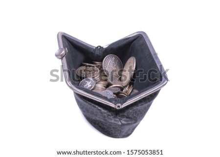 coins are in an open, gray leather wallet, the photo is taken on a white background, object is isolated
