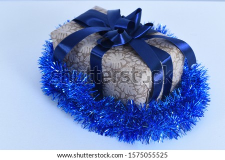 Christmas gift box blue ribbon