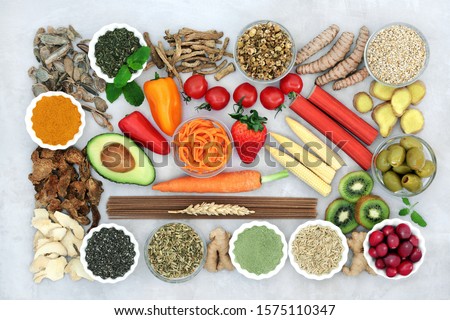 Health food & herbs used in natural & chinese herbal medicine to treat irritable bowel syndrome. High in antioxidants, protein, dietary fibre, vitamins, minerals, smart carbs & anthocyanins. Flat lay.