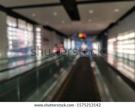 modern architecture steps of moving business escalator.,Escalator with motion blur effect in some modern building.