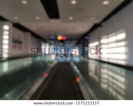modern architecture steps of moving business escalator.,Escalator with motion blur effect in some modern building.
